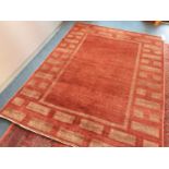 Contemporary rug on red ground with rectangular pattern