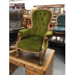 Victorian open armchair with green velvet upholstery with turned scroll arms and legs