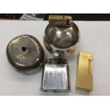 Gold plated Dunhill lighter, Ronson lighter, globe table lighter and a pen holder