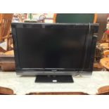 Sharp flatscreen television - model no LC-32SH7E-BK