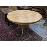 Beech dining table with circular top on pedestal base