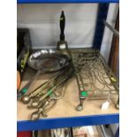 Old Sheffield plate frying pan together with various other metalwares, trivet, fire irons etc