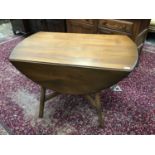 Ercol style drop leaf dining table on square legs
