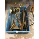 Assorted brass fire irons, stand and folding guard
