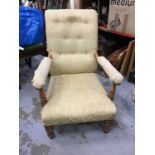 Victorian armchair with yellow upholstery on turned front legs