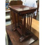 Nest of four Edwardian inlaid mahogany occasional tables, on turned supports