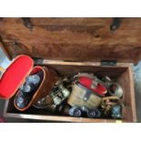 Wooden chest filled with copper and other sundries