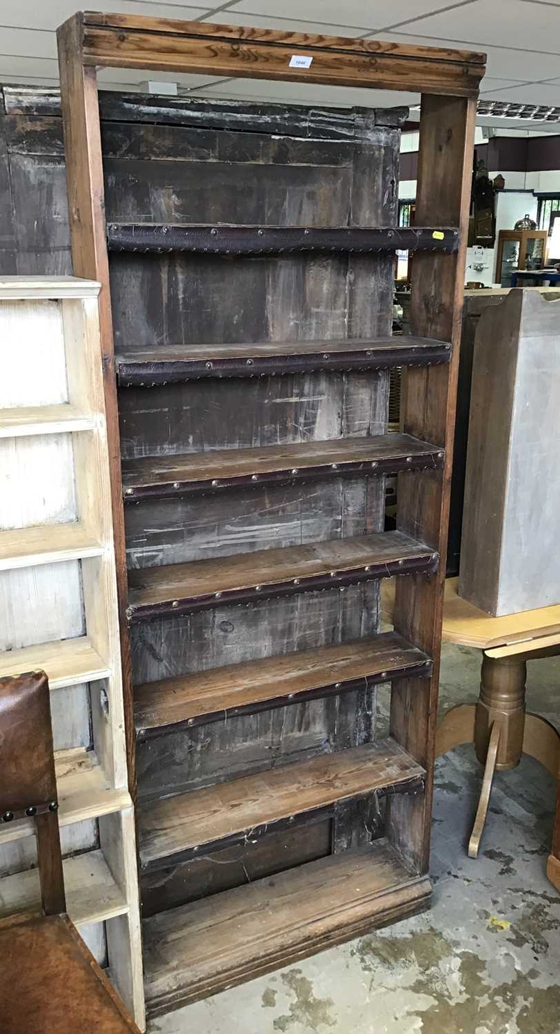 Antique pine narrow open bookcase with six shelves, together with six other open bookcases/bookshelv