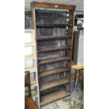 Antique pine narrow open bookcase with six shelves, together with six other open bookcases/bookshelv