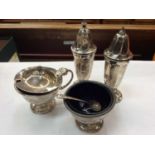 Pair silver salt and pepper castors, silver mustard pot and silver salt with spoon