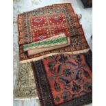 Group of four Persian rugs and a runner
