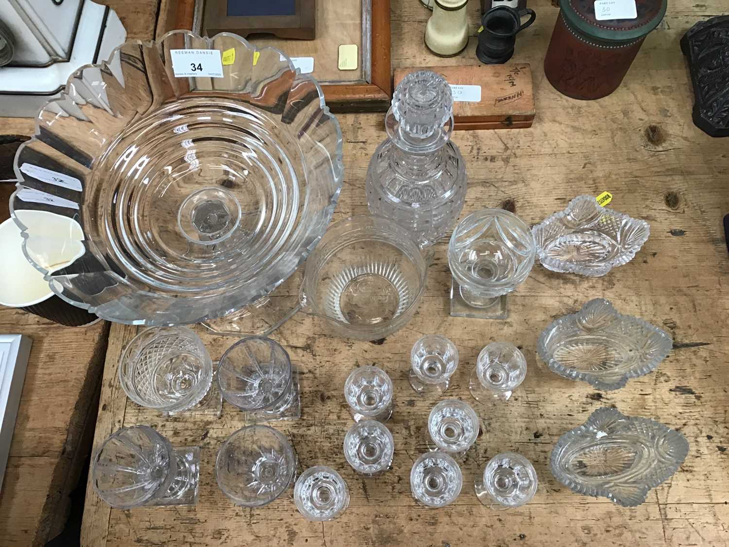 Group of 19th century and later cut glassware, including a centrepiece, finger bowl, decanter, drink