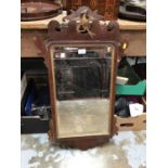 19th century Chippendale revival mahogany framed wall mirror with gilded phoenix cresting