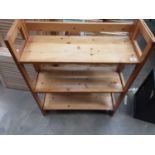 Pine folding bookcase and a selection of pine Louvre doors