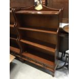 Pair Georgian -style mahogany waterfall bookcases each with two drawers raised on cabriole legs