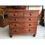 Victorian mahogany chest of draws comprising two short and three long draws with turned bun handles,