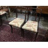 Pair of Regency sabre-leg chairs