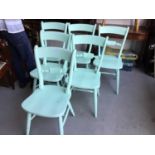 Set of six painted wood kitchen chairs on turned legs joined by stretchers, each approx 90cm in heig