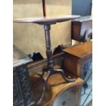 George III mahogany tilt top wine table, with turned column support on tripod base, 53 x 68cm