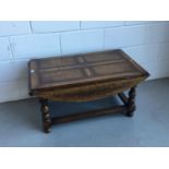 Good Quality reproduction oak coffee table by Titchmarsh & Goodwin with drop leaves and turned balus