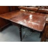 Early Victorian mahogany drop leaf dining table