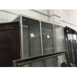 Three metal framed glass display cabinets