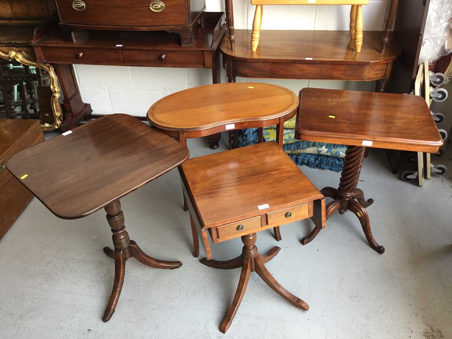 Edwardian Mahogany kidney shaped two tier occasional table, together with a mahogany tilt top wine t