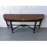 Edwardian Mahogany serpentine fronted console / hall table, two draws below, on turned legs with str