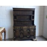Manner of Titchmarsh & Goodwin- Good Quality reproduction oak two height dresser with raised panelle