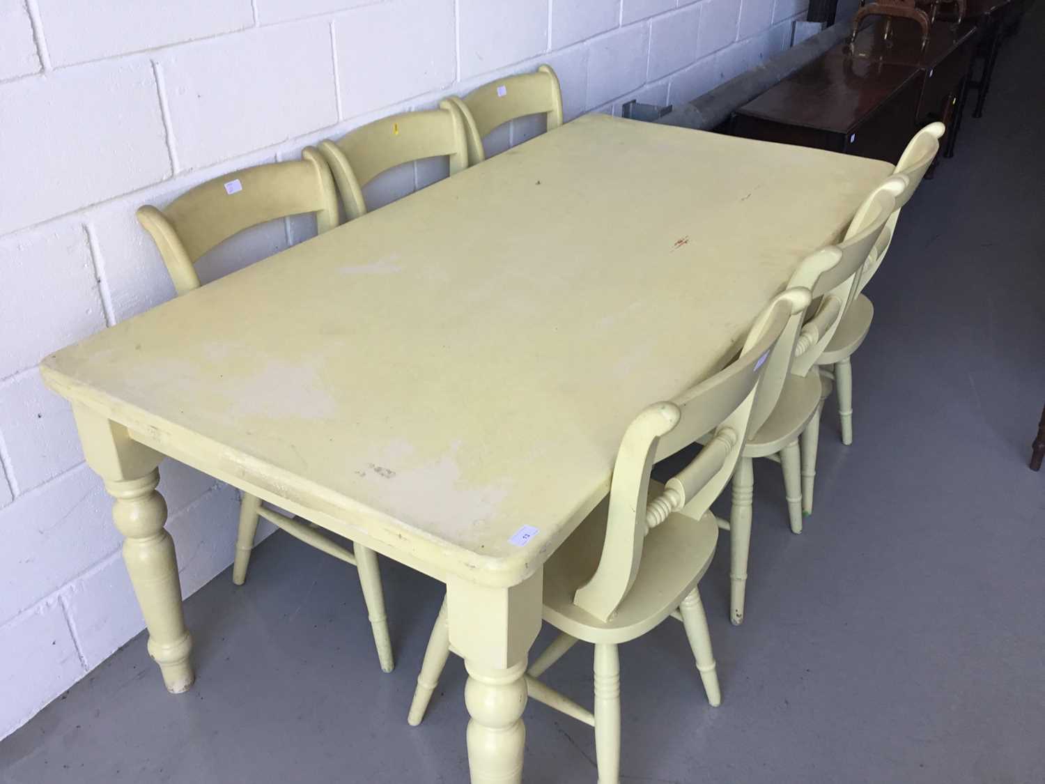 Large painted pine kitchen table on turned legs, together with six similarly painted chairs (7 piece