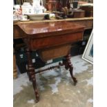 Mid 19th century mahogany sewing table with fold over top, drawer and needlework bag below on end st