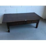 Good Quality oak low coffee table of rectangular form with two draws, on square taper legs, 140cm in