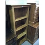 Contemporary light oak open book case with four shelves to interior, 65cm in length, 150cm in height