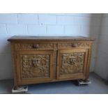 Edwardian heavily carved oak side board