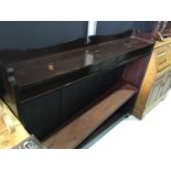 Mahogany open book case with raised ledge back and adjustable shelves to interior, 153cm in length,