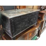 19th century carved oak coffer with planked top, 91 x 46 x 46cm