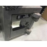 Small grey freestanding Safe with key