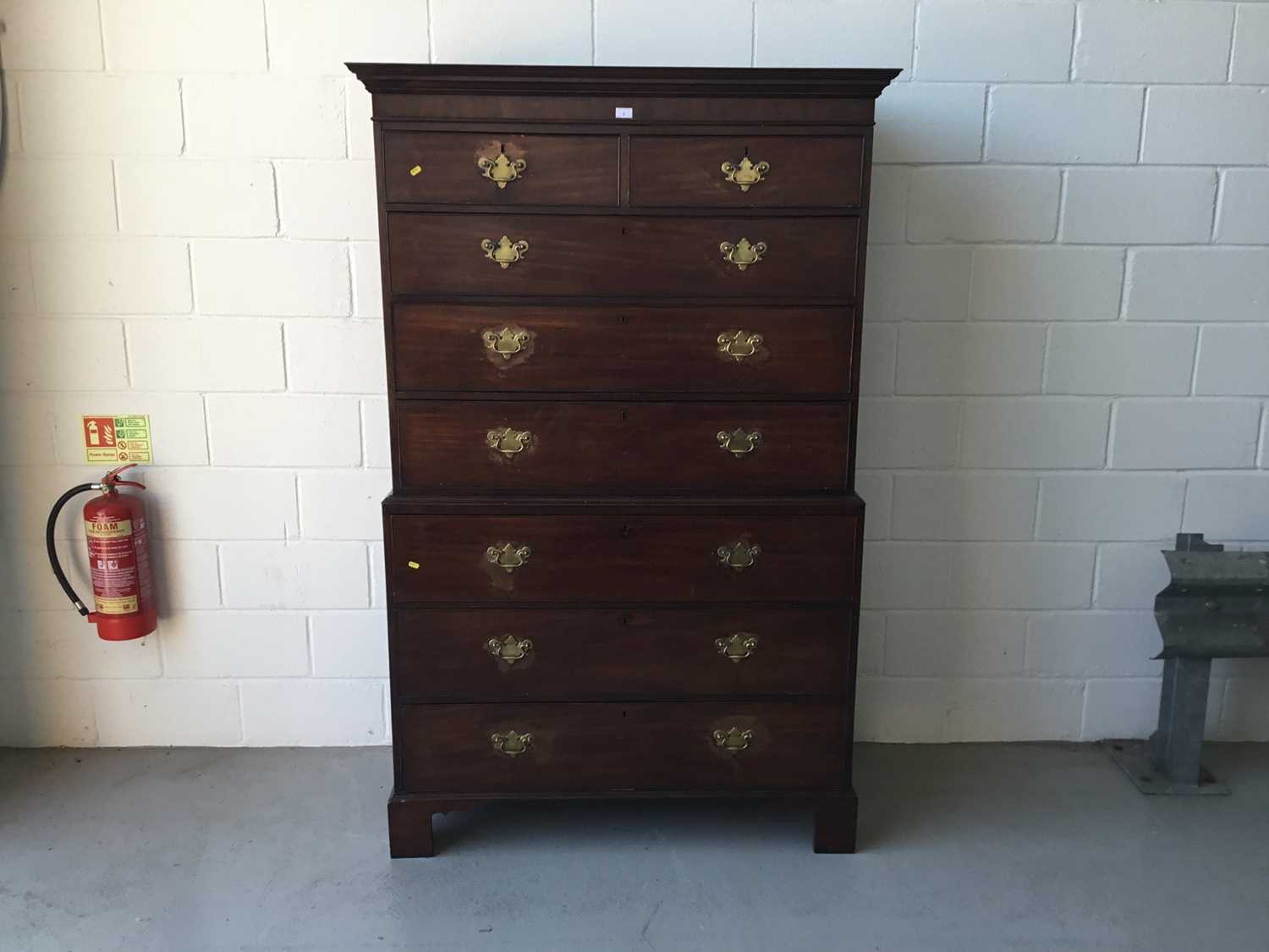 George III Mahogany Chest on chest, with two short and six long draws, brass swan neck handles, on b