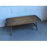 Ercol 'Golden Dawn' coffee table of rectangular form with under tier, 104cm in length, 36cm in heigh