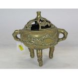 Chinese Brass Censor with raised flowering prunus decoration, raised on three legs, with character m