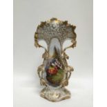 Late 19th century Continental porcelain vase of shaped form with central hand painted scene depictin