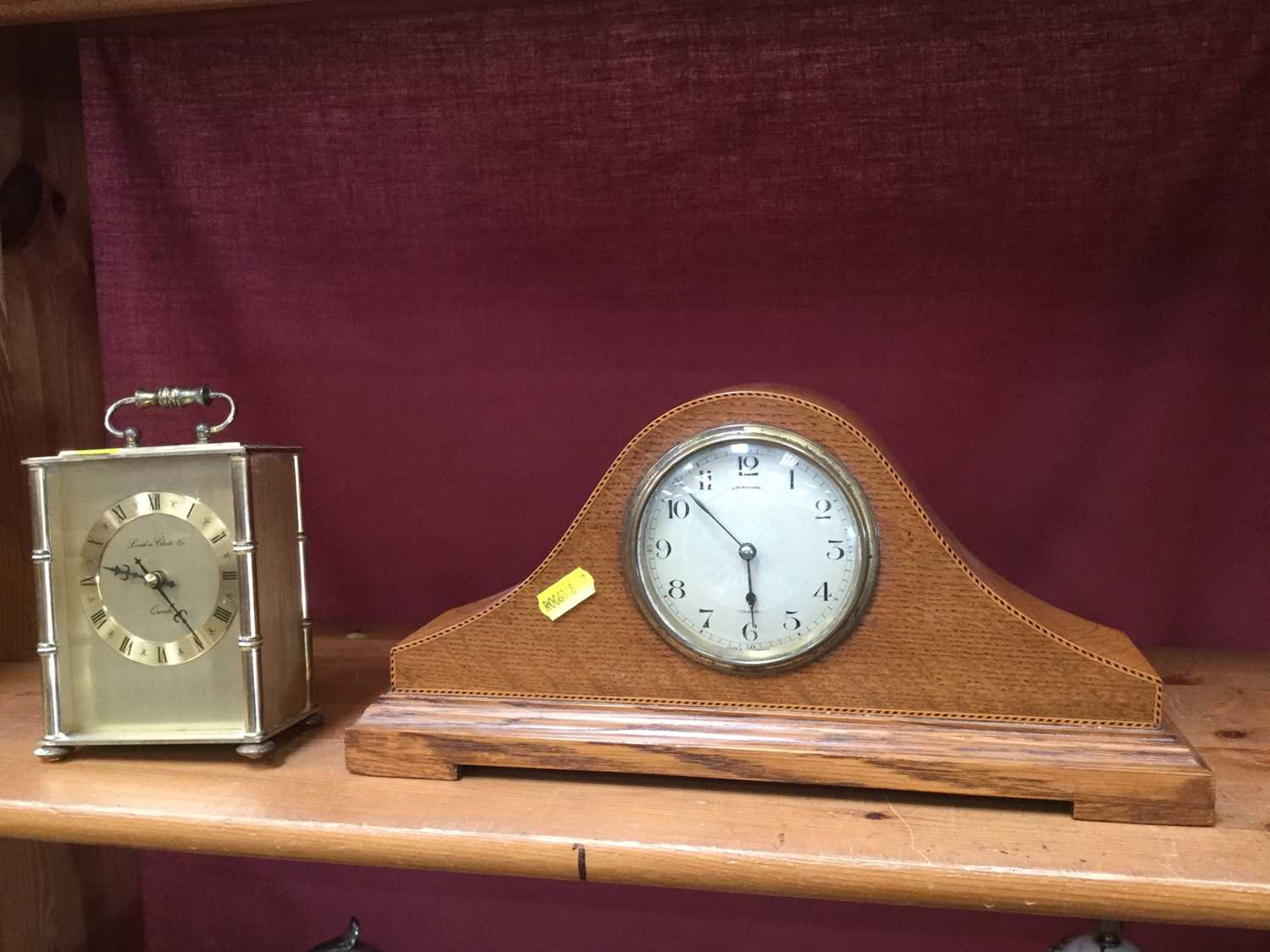 1930s Golden Oak mantel clock by JW Benson together with another modern quartz mantel clock (2)