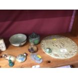 Chinese carved and pierced hardstone Bi disc, three Chinese greenstone bowls, Chinese snuff bottles