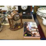 Edwardian arcaded mantel clock, together with clock repair book (clock featured on front cover)