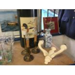 Large pricket candlestick together with brass lamps and other items