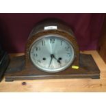 Early 20th century oak helmet shaped clock