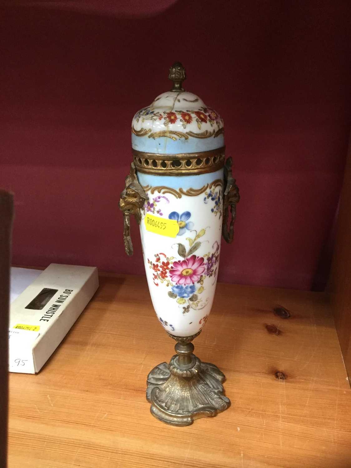 19th century Continental painted porcelain urn and cover with metal mounts