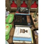 Selection of antique referencing books, including the Art of Netsuke Carving, Sotheby's sale catalog