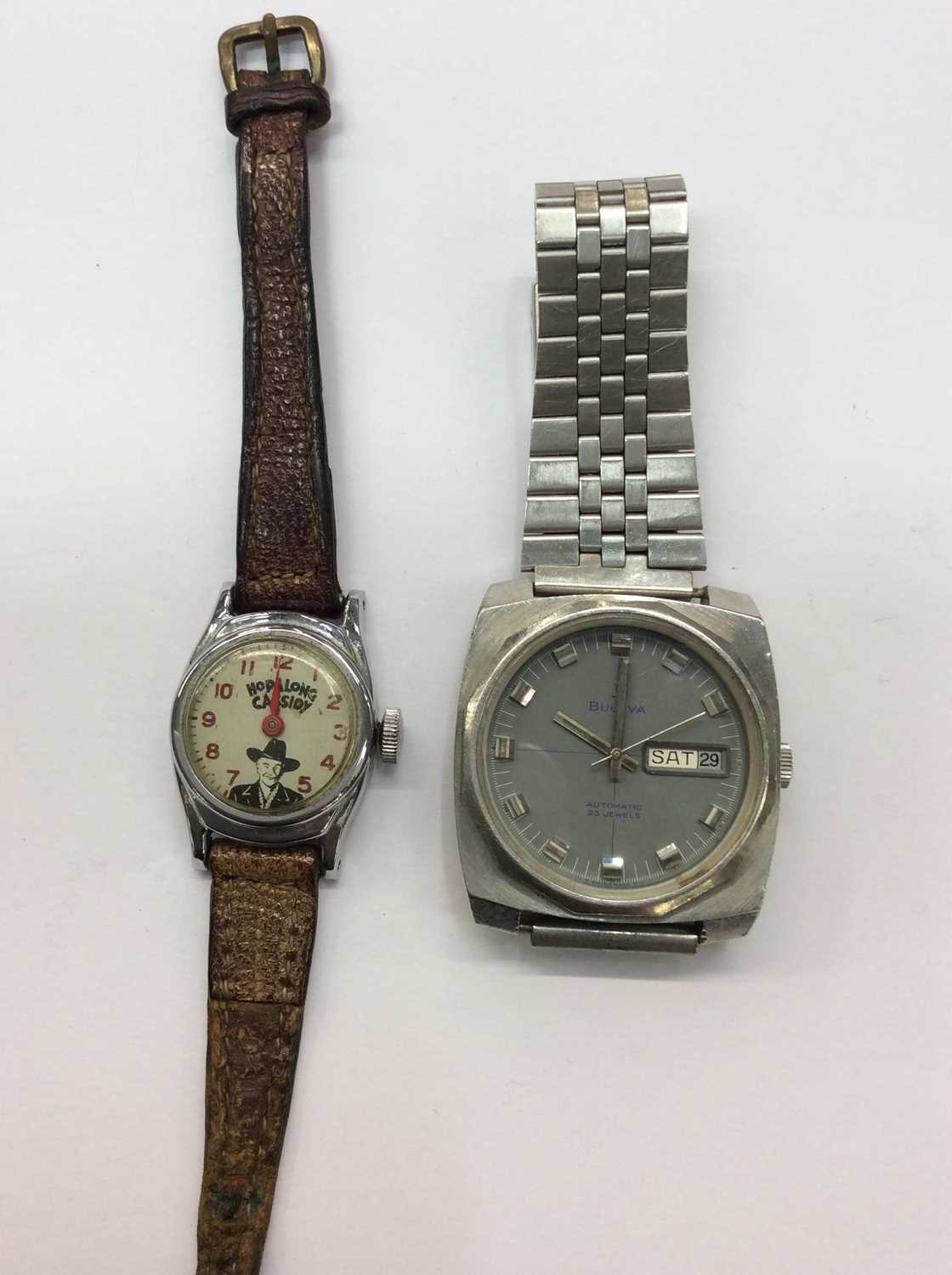 Bulova stainless steel wristwatch with grey dial and date aperture, together with a vintage Hopalong