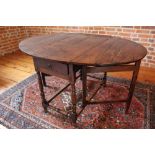 Fine and rare late 17th/early 18th century yew gateleg table, the oval top with two frieze drawers,
